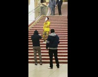 Man with mask music video stairs