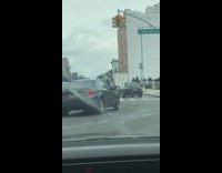 Guy dancing across street causes traffic 