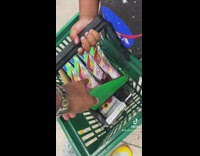 Little boy green basket with candy 