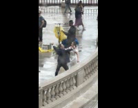 Collab IITW - Bride and Groom dances near the busker at the park after the rain