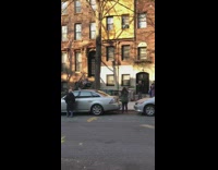 Guy plays guitar neighbors sing along apartment