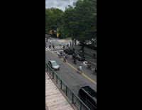 Biker crashes into black car during marathon 