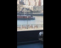 Woman Films Herself Outdoors Near River