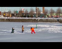 Woman orange jacket lean on side snow