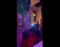 Collab WINY - Woman does cartwheel inside bar 