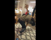 Woman jumps off bunk bed like superhero and startles roommate