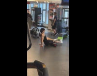 Man on TV workout inside of gym