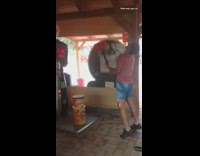 Guy hits himself toy red hammer game