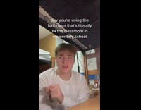 Guy white shirt im dorm room rocking back and forth