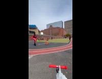 Woman in red leggings practice jumping shoes