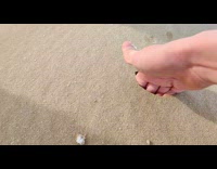 Guy finds snow underneath layer of sand 