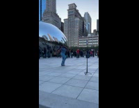 Woman blue top tiktok dance cloud gate