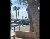Man shadow boxing video on car roof
