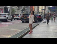 Male model with long ponytail and pink shoes