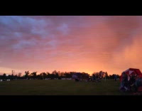 Visible Double Rainbow at Crowded Open Field 