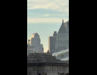 Person filming content on top of manhattan bridge