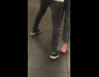 Woman dances barefoot in subway station to live band Havana song