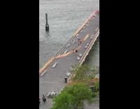 People get pushed by orange banner 