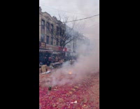 Firecrackers explode on street for new year Part 1