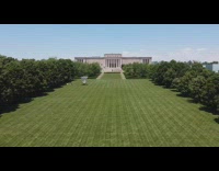 Drone flies over large white birdie shuttlecocks 