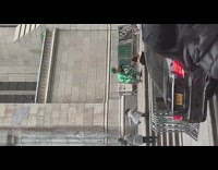 Rat costume guy wears green suit 