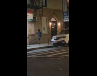 Guy parkours off wall 