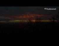 Drone flies over mountains during sunrise snow 