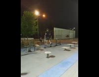 Guy use elliptical walking machine park night part 1