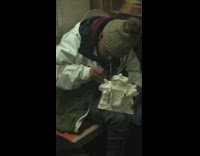 Guy makes elaborate soap building sculpture on subway train