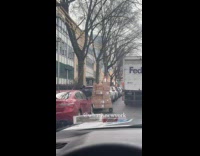 Fedex driver left truck blocks the street