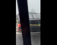 Car accident stuck on the concrete barrier