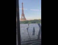 Guy on train sees proposal by eiffel tower 
