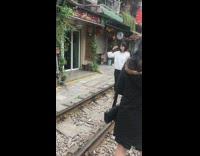 Train tracks photo shoot girl white shirt dance