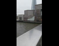 Collab IITW - Woman sits on edge of London bridge