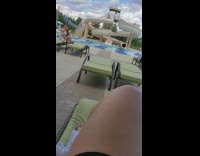 Girl sits green pool chair selfie slide 