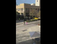 Girl side walks to film friends walking 