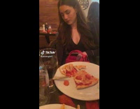 Lady Slips Credit Card Underneath Table to Man