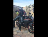 ClipsIG - Man Waters Miniature Black and red sports Bike and Turns into Big Bike