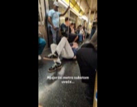 Guy leaks alcohol from pocket inside train