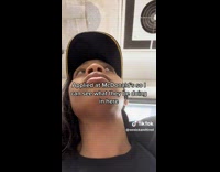 Lady Watches Fellow Colleagues Argue in Background