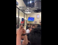 People crowding wingstop for t-mobile promo