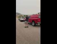 Guy rides hoverboard drinks beverage then falls