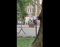 Five people hands out by head frozen 