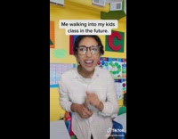 Woman walks into green screen classroom 