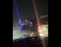 Guy selfie outside window SUV expressway night