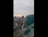 Workers replace the letter F on salesforce building
