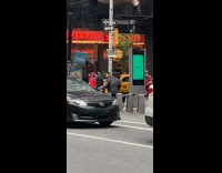 Two men fight over the last Citi bike on the sidewalk