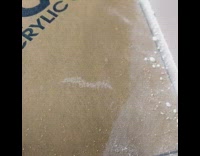 Power tool creates small white balls 