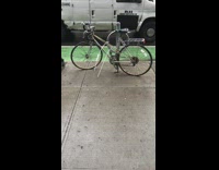 Person uses zip ties to lock bicycle 