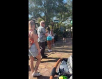 Three women tiktok dance at Disney World